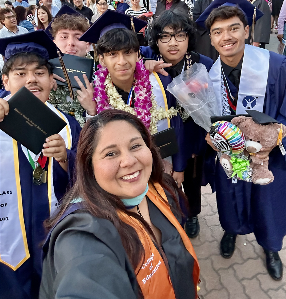 Mrs V with graduating seniors of the class of 2024