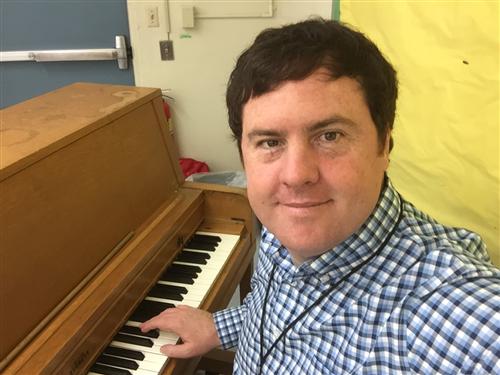 Mr. Guy at the piano 